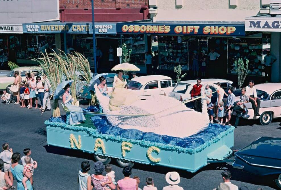 Flashback: Osborne's Gift Shop forms part of the backdrop as a North Albury Football Club float passes by during the city's Floral Festival in the late 1960s. Picture: DALLINGER COLLECTION
