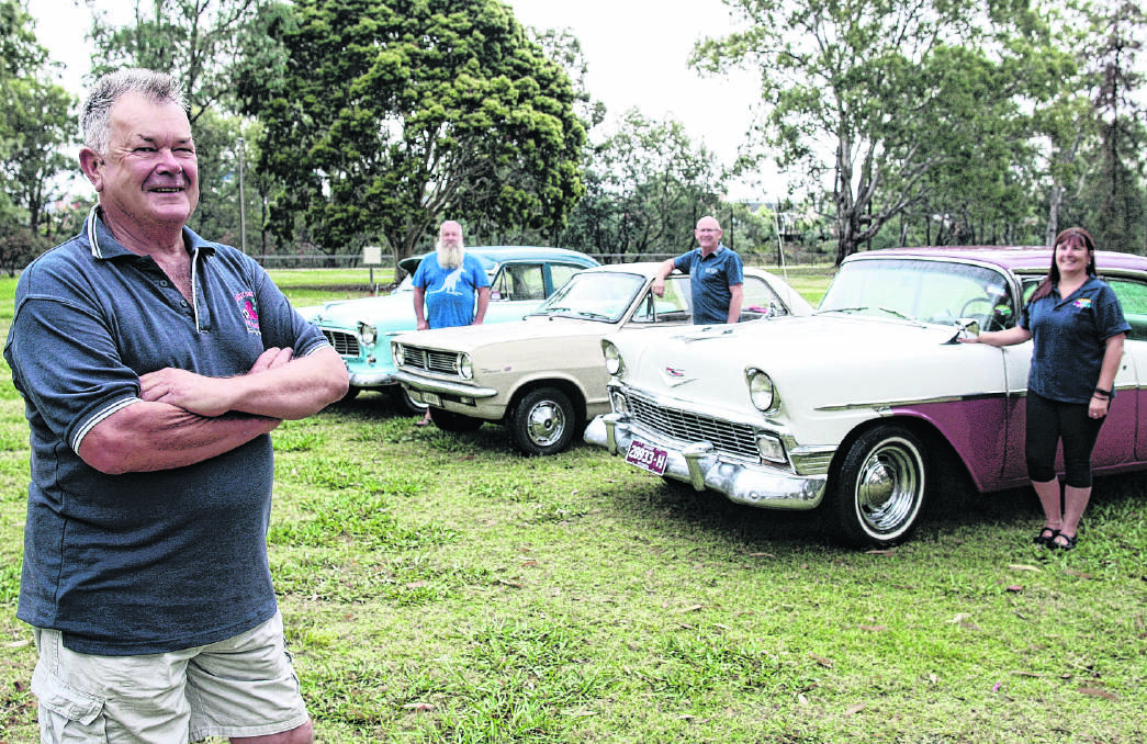 Long-time Holden man: Early Holden Car Club of Wangaratta Lester Hilli (left) with old models that featured at a previous club day. Picture: WANGARATTA CHRONICLE