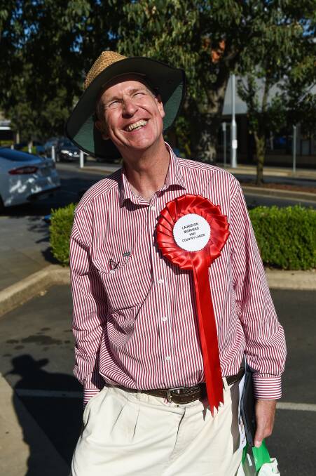 Distinctive: Lauriston Muirhead made sure his attire was a talking point, wearing a giant red rosette normally associated with the British Labour Party than its Australian cousin. Picture: MARK JESSER