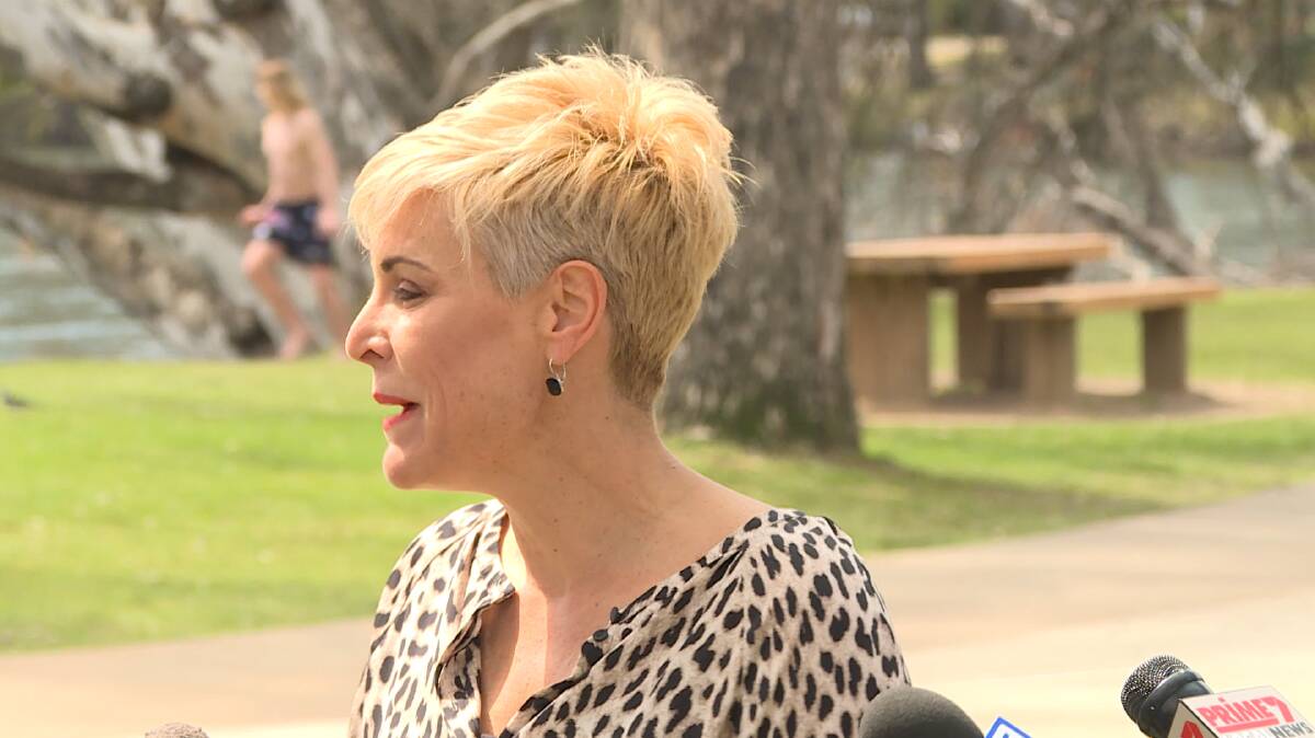 I'm out of here: Anna Speedie turns to leave her media conference at Noreuil Park after refusing to answer questions about the fiasco surrounding the contract for pool operations in Albury-Wodonga. Picture: 9NEWS BORDER NORTH EAST