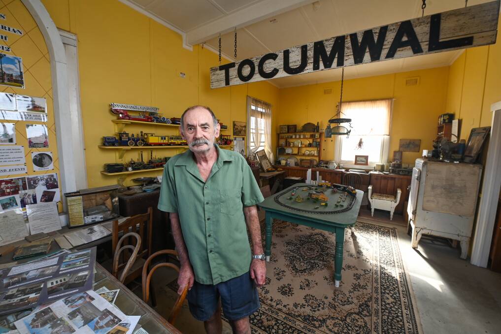 Welcome mat out: Tocumwal Railway Heritage Museum curator Bernie Williams inside the old station building with relics from its heyday. A group of passengers will pull into to the platform this evening. Picture: MARK JESSER