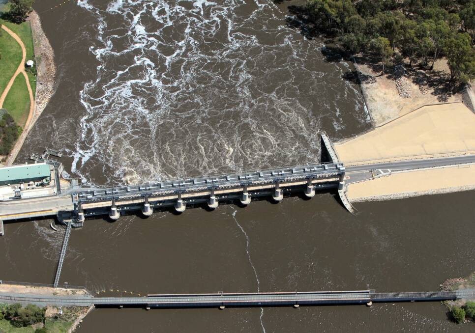 Yet to wash through: A date for the closure of the road across Yarrawonga's weir wall is still to be determined, 16 years after its demise was announced.