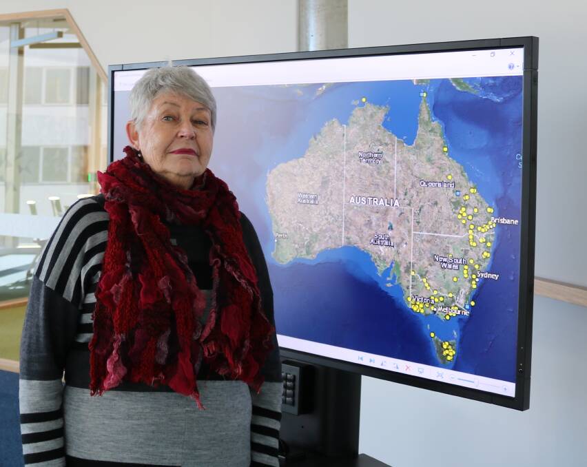 Dire dots: Professor Lyndall Ryan with new map depicting sites of Aboriginal massacres in eastern Australia. Picture: UNIVERSITY OF NEWCASTLE