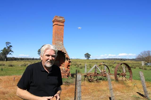 On location: Gary Hunn at the remains of the old Kelly homestead at Eleven Mile Creek in the North East. It took some negotiation for him to film at the property.