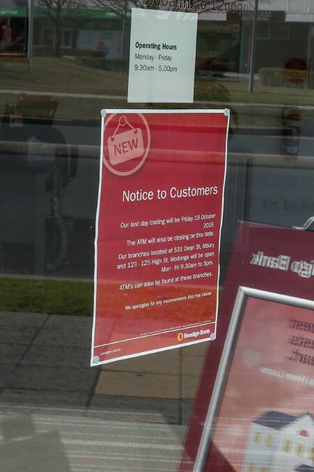 Writing on the glass: Message informing clients of the Bendigo Bank that the Lavington branch is shutting permeantly.