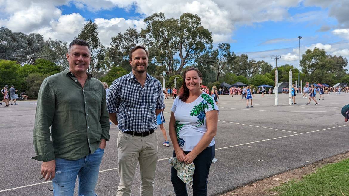 Courting votes: Wangaratta mayor Dean Rees with Indi candidates Ross Lyman and Elizabeth Fisher at a netball tournament on Sunday.