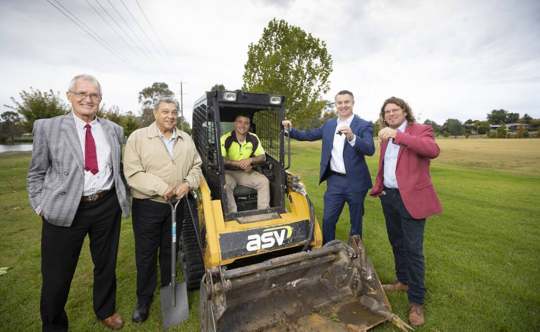 Ceremonial dig: Jos Weemaes with fellow Rotarian Matt Burke, digger driver Sam Mason and deputy mayors Graeme Simpfendorfer and Steve Bowen at Belvoir Park on Friday morning. Picture: ASH SMITH