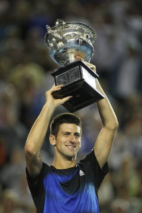 Flashback: Novak Djokovic after winning his first Australian Open in 2008. He has been wanting to have his name etched on the winner's trophy for a tenth time in 2022. 