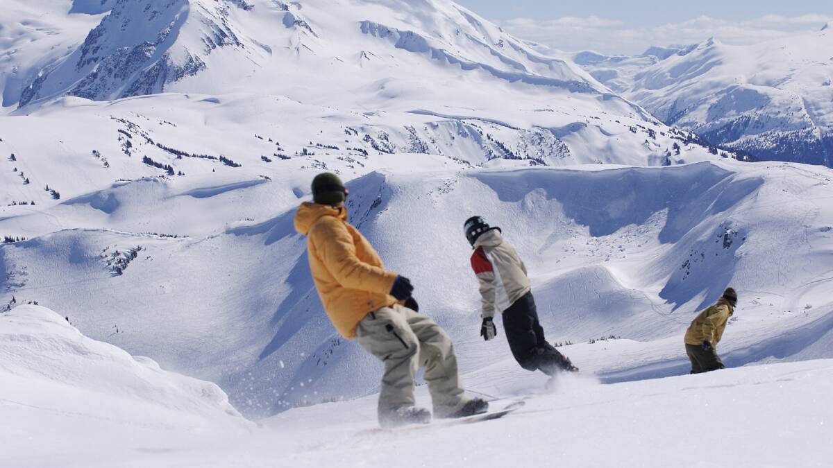 Overseas lure: Snowboarders at Whistler Blackcomb, one of the resorts owned by Vail that is being touted as a place Victorian skiers can access as part of the Epic Australia Pass. Picture: TOURISM BRITISH COLUMBIA