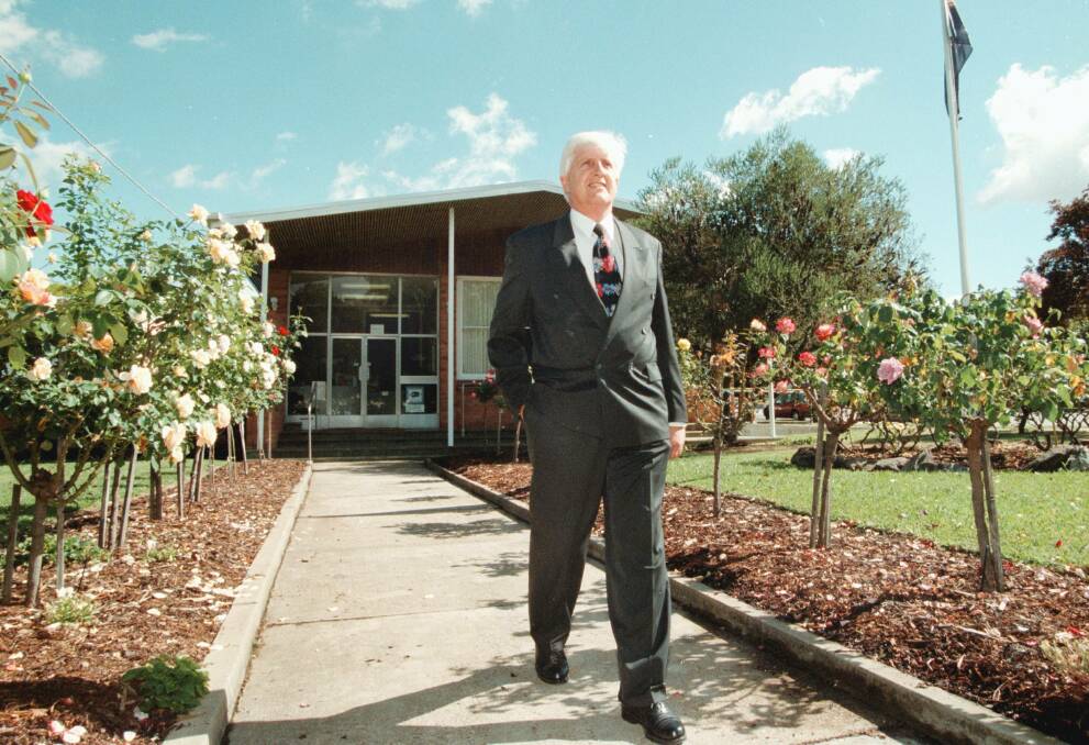 Flashback: Lyndon Webb in 1999 at the time he was appointed chief executive of Towong Council. He is pictured walking down the footpath outside the shire's Tallangatta headquarters.