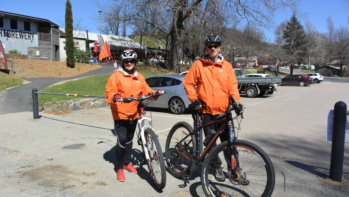 Holiday drama: Retirees Marcia and John Paxton after he was swooped on while cycling through Howitt Park. Mrs Paxton wheeled her back and was not attacked. They were advised to wear bright colours during a visit to a Myrtleford bike shop.