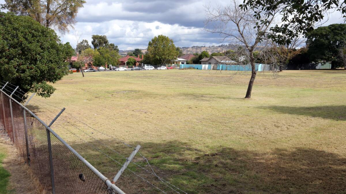 Makeover coming: Land which once played host to swimming pools in central Wodonga looking towards Stanley Street. It is set to be developed by a Sydney buyer.