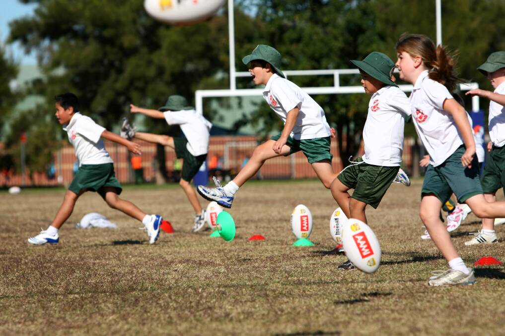 Flashback: Students from Holy Spirit school participate in a rugby league clinic at Sarvaas Park in 2011.