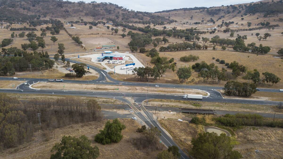 Controversial: Aerial view of the modified McKoy Street-Hume Freeway intersection which was rejigged and had a speed limit change to coincide with the opening of the United petrol station. 