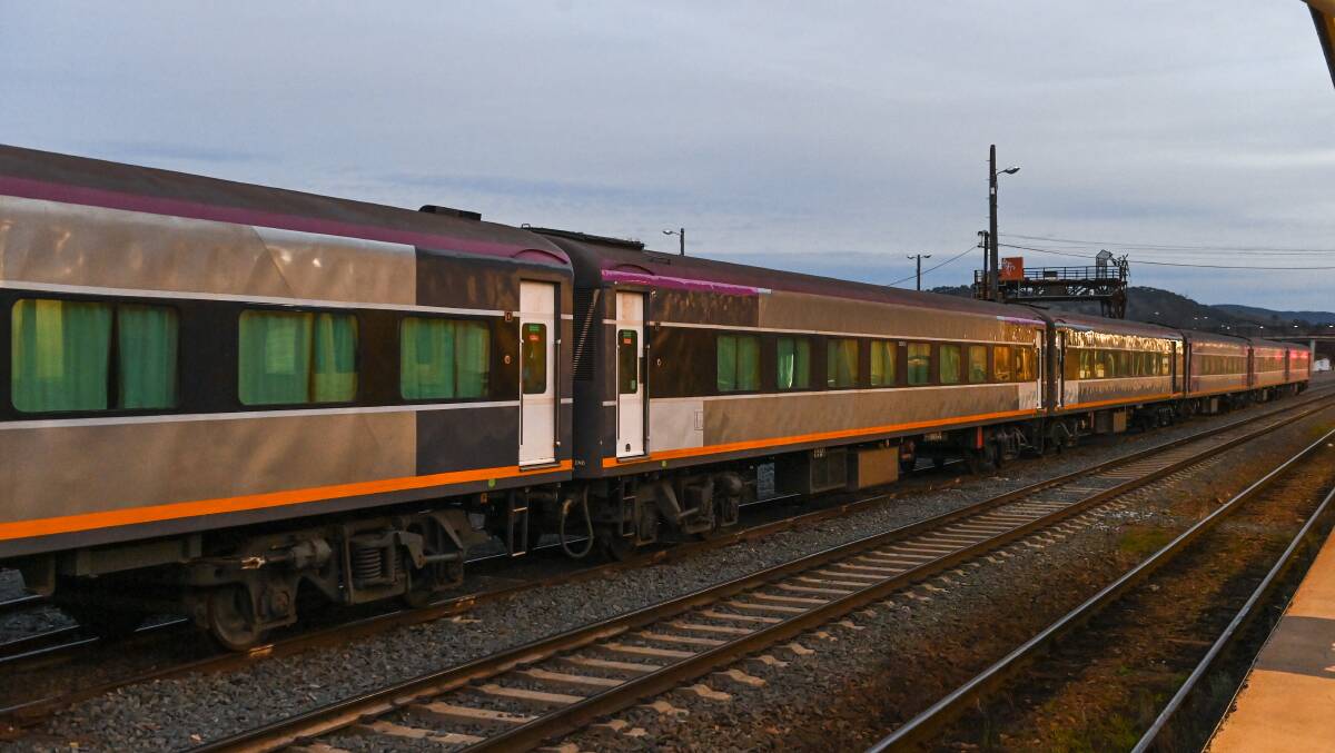 Stripped back: The N Class carriages minus V/Line signage sit in the Albury railway yard awaiting a lift to Ettamogah. Picture: MARK JESSER