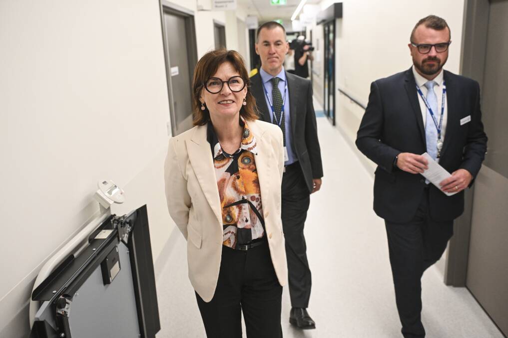 Victorian Health Minister Mary-Anne Thomas in a corridor of the new Albury hospital emergency department with Albury Wodonga Health's chief executive Bill Appleby and chair Jonathan Green. Picture by Mark Jesser