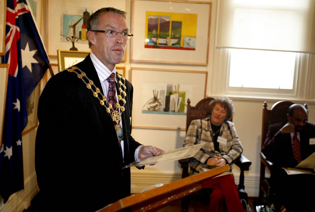 Flashback: Stuart Baker with the mayoral chain on to preside over a citizenship ceremony at Albury art gallery in 2008.