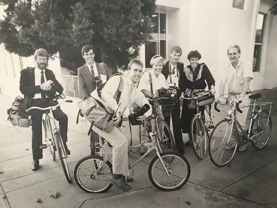 Part of the team: Peter Batson (far right) with other Border Mail photographers and the bicycles they used to traverse around Albury for Queen Elizabeth's visit in 1988 which saw streets closed off.