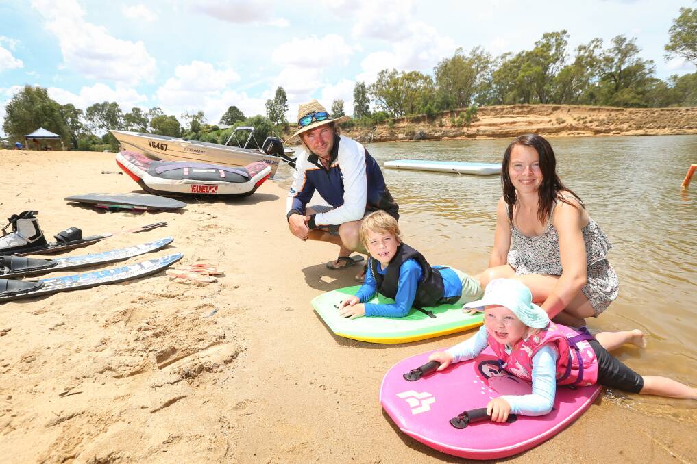 On tour: Phillip Island's James and Nicole Haslett and their children Lucas, 7, and Lexi, 2, enjoy the Murray River.