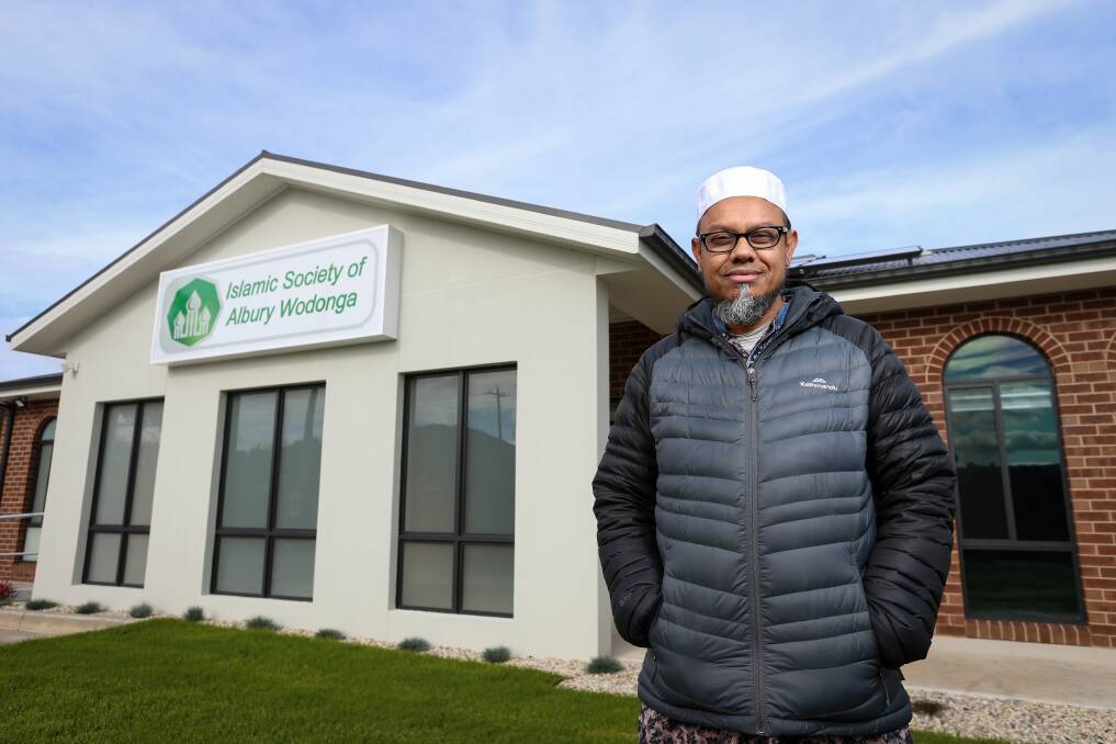Proud of the outcome: ASM Asaduzzaman stands outside the recently-built mosque in Lavington's Wagga Road, the only such building between Melbourne and Sydney. Picture: JAMES WILTSHIRE