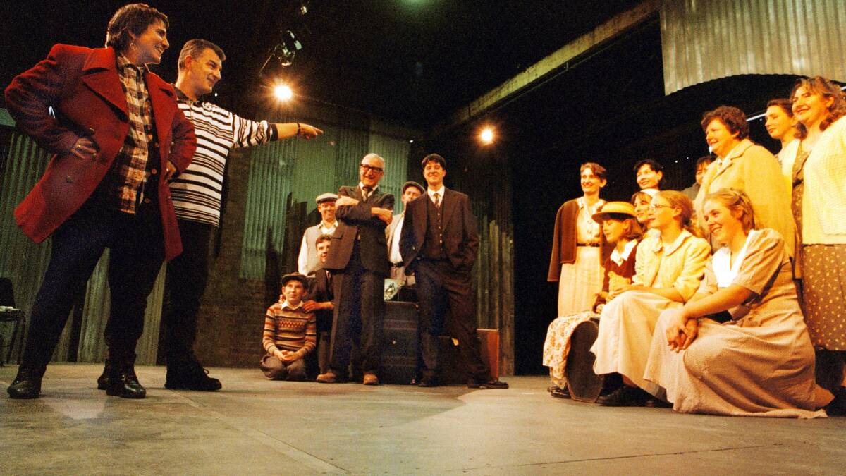 Flashback: Writer Tes Lyssiotis and former Kingswood Country actor Lex Marinos with the cast in the 1997 production of Hotel Bonegilla.