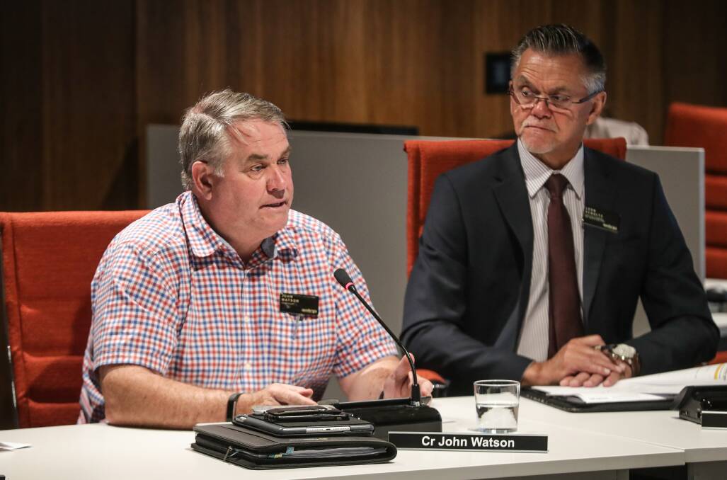 Online: John Watson in the council chamber with city manager Leon Schultz. A trip to Sydney means the former mayor is now in isolation and Monday night's meeting will be conducted online.