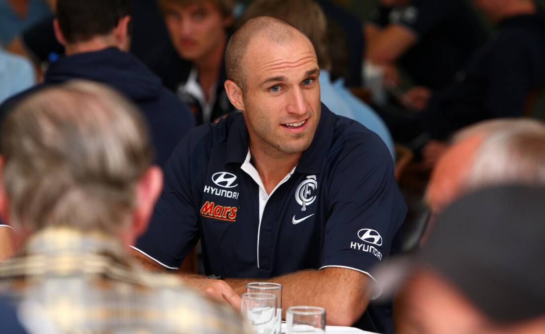 Not the same: Albury mayor Kevin Mack says he is no local government Chris Judd. The former footballer is pictured during a visit to Benalla in 2011.