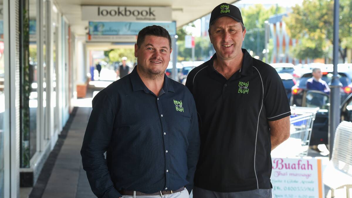 Helping hands: Boys to the Bush's Adam DeMamiel and Tim Sanson, who founded the program alongside Richard Leahy, after the funding promise. Picture: MARK JESSER