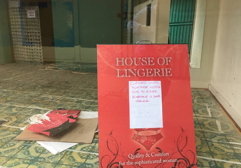 Forlorn: A shut sign in the House of Lingerie shop, which adjoins RM Fresh cafe which was gutted by fire last month. The undergarments retailer had its stock ruined and owner Anne Lafferty is now looking for a new shop.