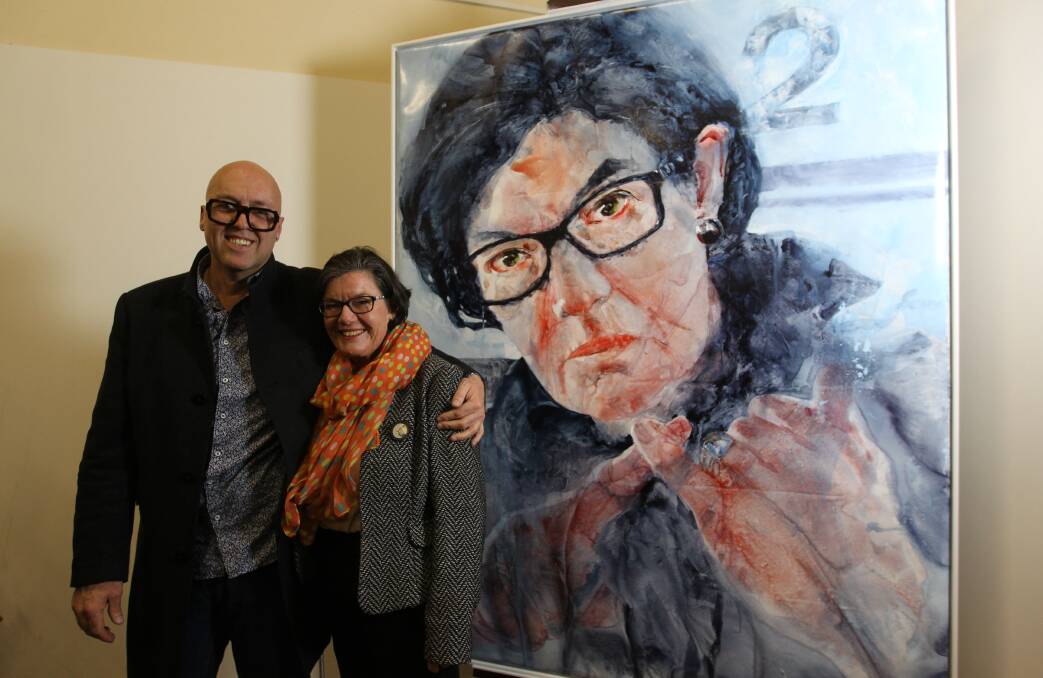 Missed out: Artist Charles Sluga and Cathy McGowan with his portrait which was one of 800 entries for the Archilbald Prize.