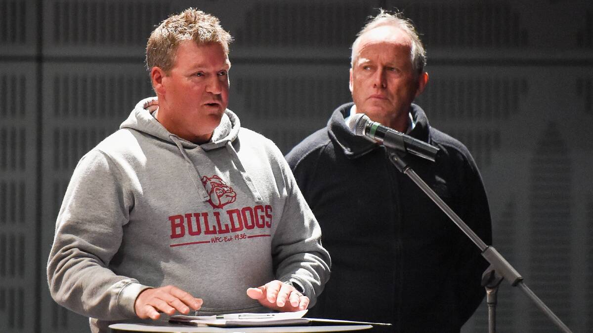 Making a pitch: Bulldogs leaders Mick Mathey and Richard Bence address Wodonga councillors as part of their bid for $25,000 to fix Martin Park's match-day netball court. Picture: MARK JESSER