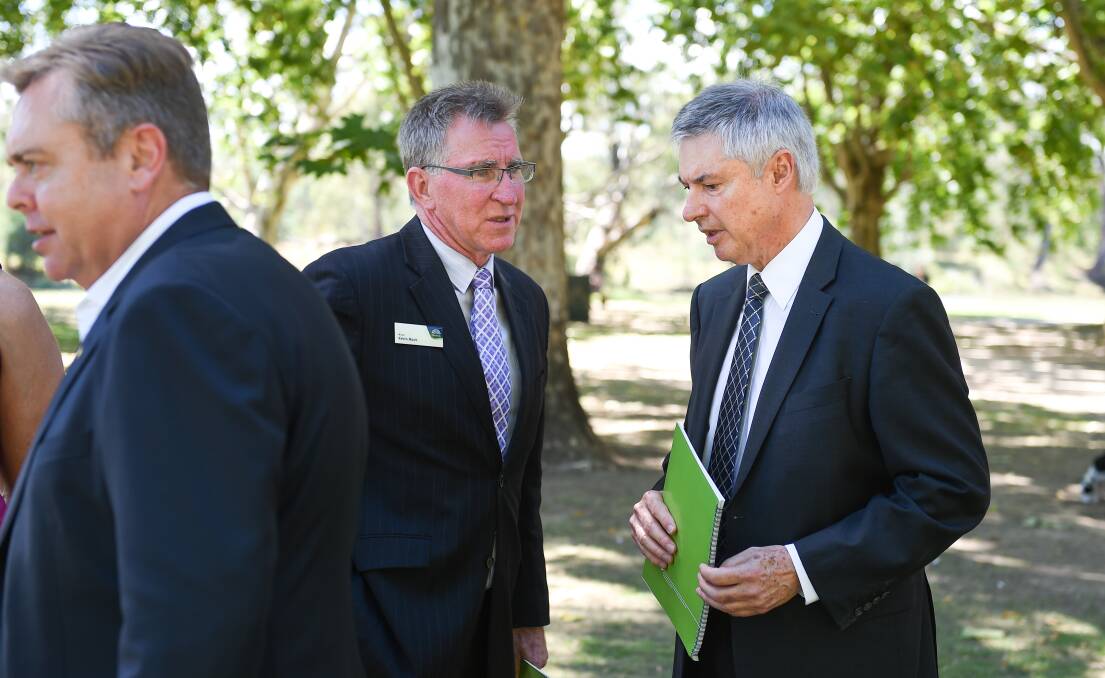 Familiar spot: Kevin Mack and Greg Aplin at Albury's Noreuil Park in March 2017. The same location was the backdrop to the mayor announcing his tilt at federal politics on Friday.