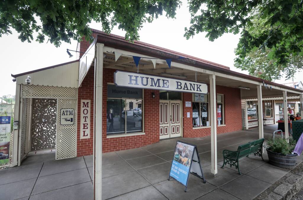 Shifting buildings: The existing Hume Bank branch at Yackandandah. The dangling sign at the front of the verandah will be installed at the new premises along with the finger-pointing ATM sign. Picture: JAMES WILTSHIRE