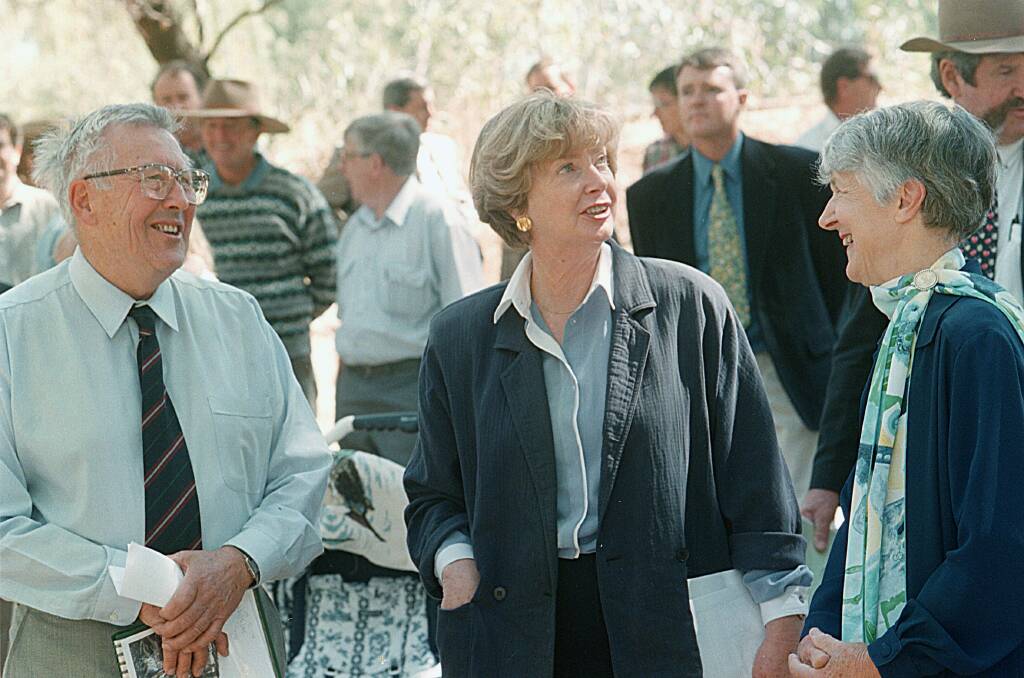 Admirable work: Then Victorian Environment Minister Marie Tehan (centre) speaks with Peter and Helen Curtis at a 1998 event to mark the environmental rehabilitation of Kaluna Park in Wangaratta.