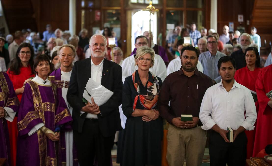 One: Liturgical deacon Kathy Cherry, Peter MacLeod-Miller, former rector of St Matthew's John Davis, Helen Haines, Mohammad Hussain and Syed Qadri during the service on Sunday. Picture: JAMES WILTSHIRE