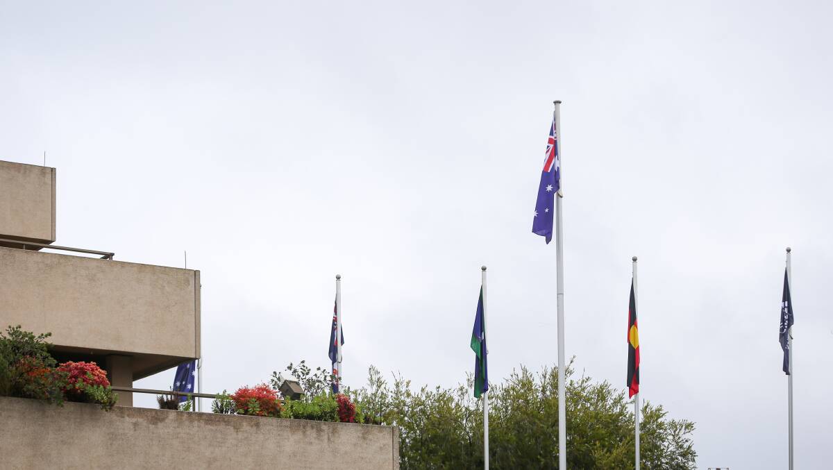 Coming soon: The flags outside Albury's council chamber. The flag on the right, which marks the City of Albury, will be replaced by the Ukrainian colours for some months.