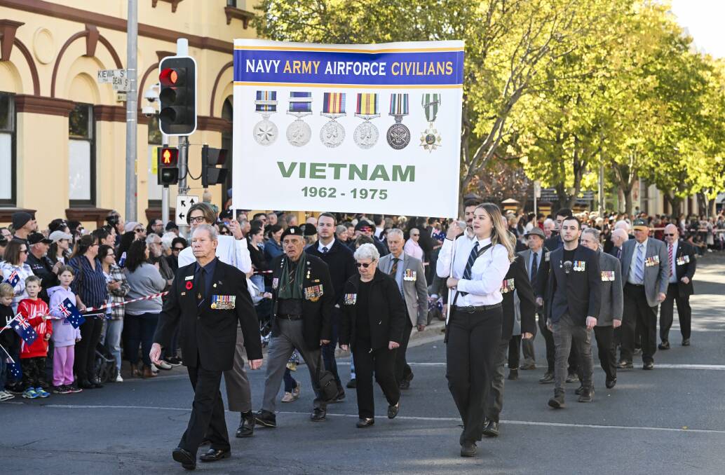 The Vietnam War party, which was much smaller than its Wodonga counterpart, passes through Albury in the Anzac Day parade. Picture by Mark Jesser