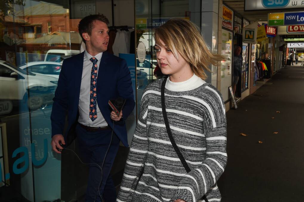 Flashback: Television journalist Josh Ribarich follows Amber Holt after an earlier court appearance in Albury.