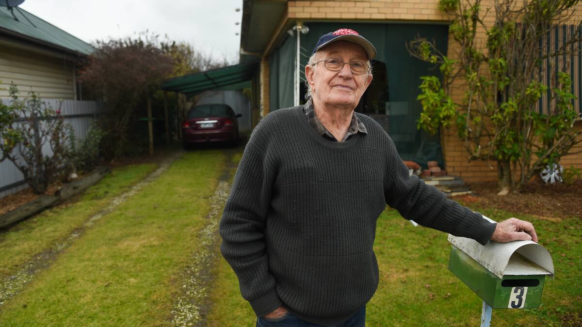 In the firing line: Tenant William Vanderpol in front of the driveway and house edge which VicTrack says it owns as part of land that cuts through the property.