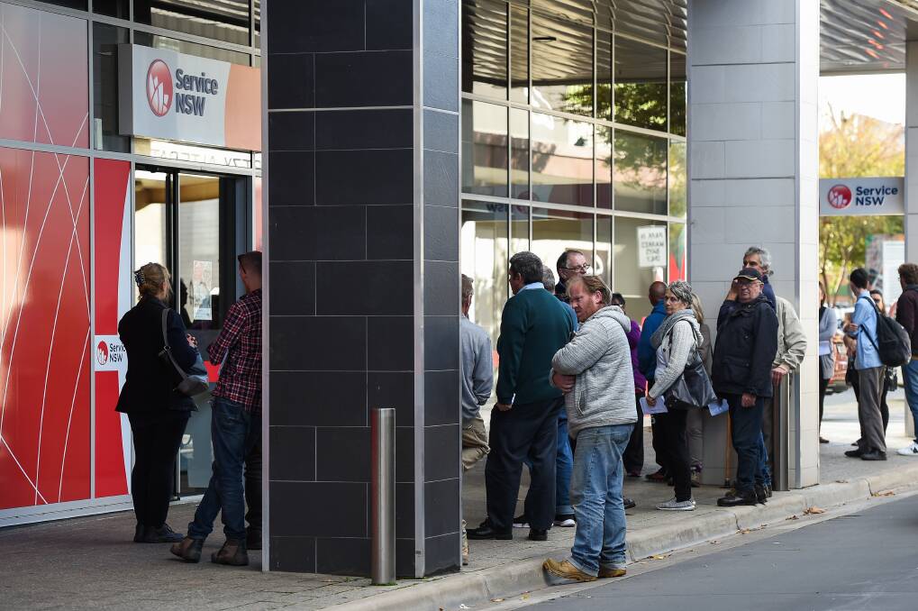 Left waiting: Clients were forced to linger on the footpath after a threat to a staff member prompted the temporary closure of Albury's Service NSW office on Thursday.