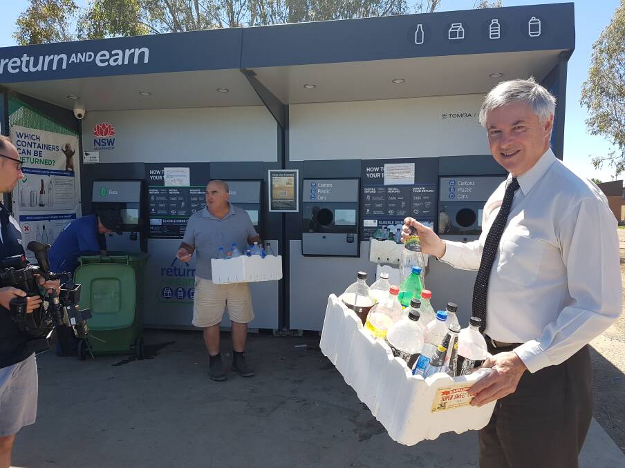 On the recycling trail: Greg Aplin at the East Albury container machine, where he announced an extension of the compensation scheme for drinks retailers.
