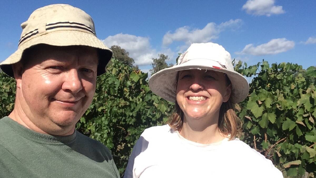 sadfDean Cleave-Smith and his partner Rosalie at their Markwood vineyard. He is overseeing the adoption of a smoke sensor system across Victoria's North East.