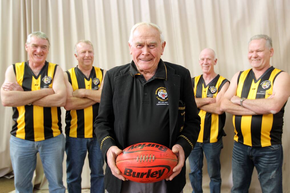 Top-shelf Tiger: Doug Welladsen in a 2011 Border Mail image promoting Barnawatha football club's centenary. Joining him (from left) were fellow former players John Pattison, Robert Allen, Greg Hooper and Peter Woodford