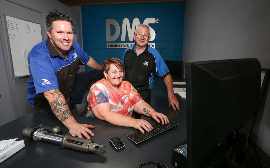 Family affair: Trevor, Yvonne and Jamie Drummond in the office of their Wodonga workshop on Friday as manufacturing ended. Picture: JAMES WILTSHIRE