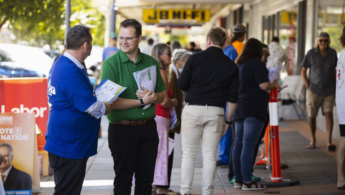 Liberal election campaign manager for Albury Chris Stern speaks to Greens candidate Eli Davern at the prepolling station. Picture by Ash Smith