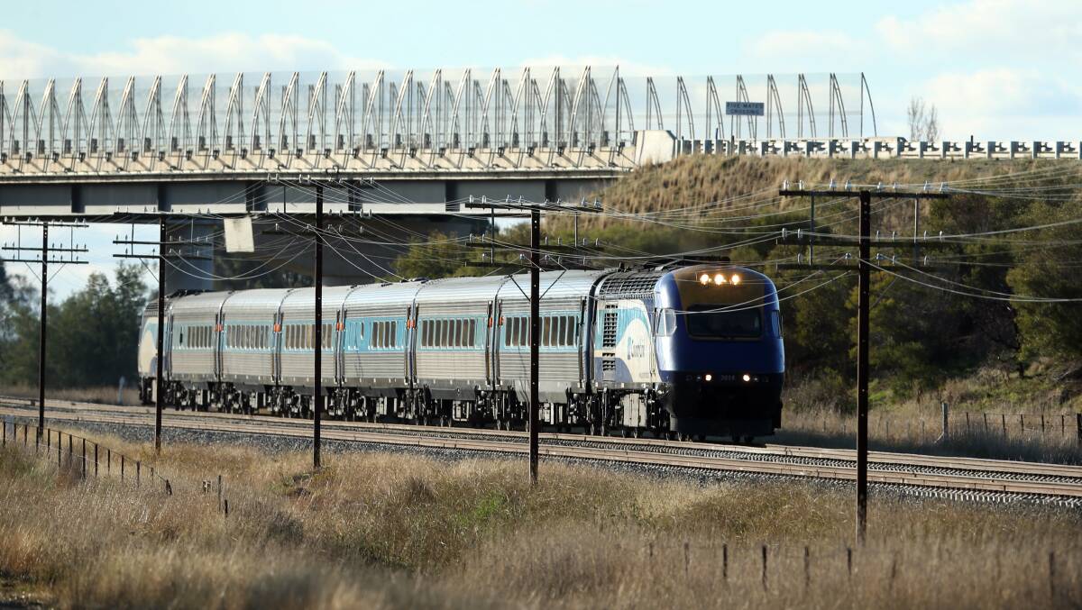 Rolling on: The XPT fleet has served on the interstate passenger service between Sydney and Melbourne since the 1980s. This train was photographed near the Five Mates Crossing at Gerogery.