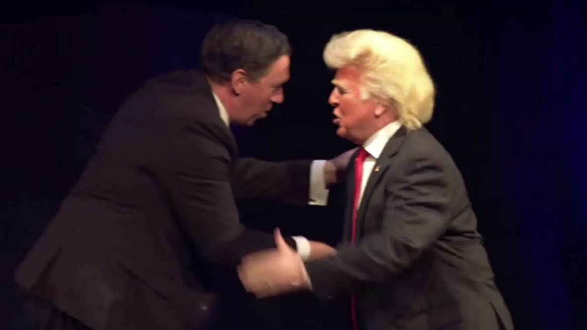 A still from the stream of the Nyet Zero gala dinner held as part of the Triple Conference. Event organiser Topher Field is greeting a Donald Trump impersonator. 