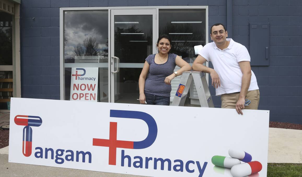 Ready to dispense: Madonna Beniamine and her husband Michael gear up to open Tangambalanga's pharmacy in the town's main street. Picture: ELENOR TEDENBORG 
