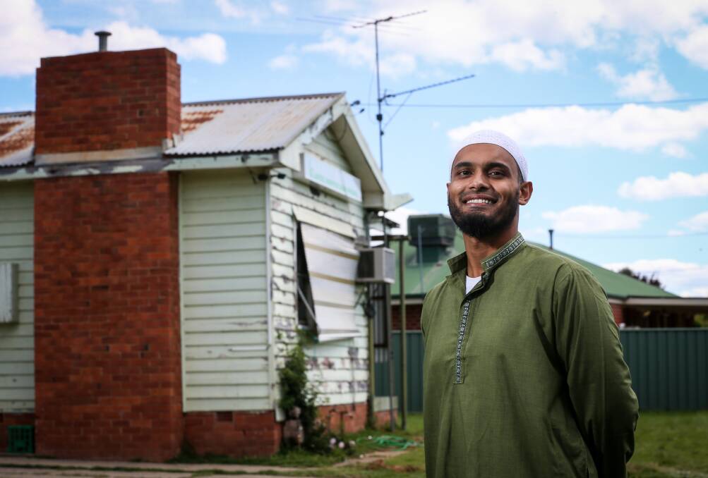 Flashback: The Islamic Society president Yakub Mohammed in 2016 with the dilapidated house that has been used as a mosque since 2013.