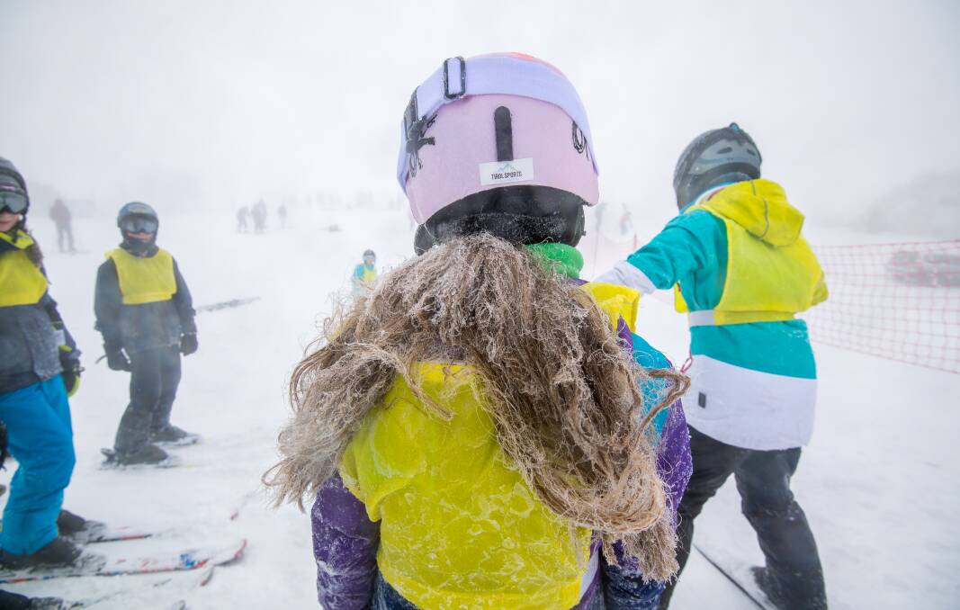 Learning: Skiers on Mount Hotham get some tuition on a low-vision day. 